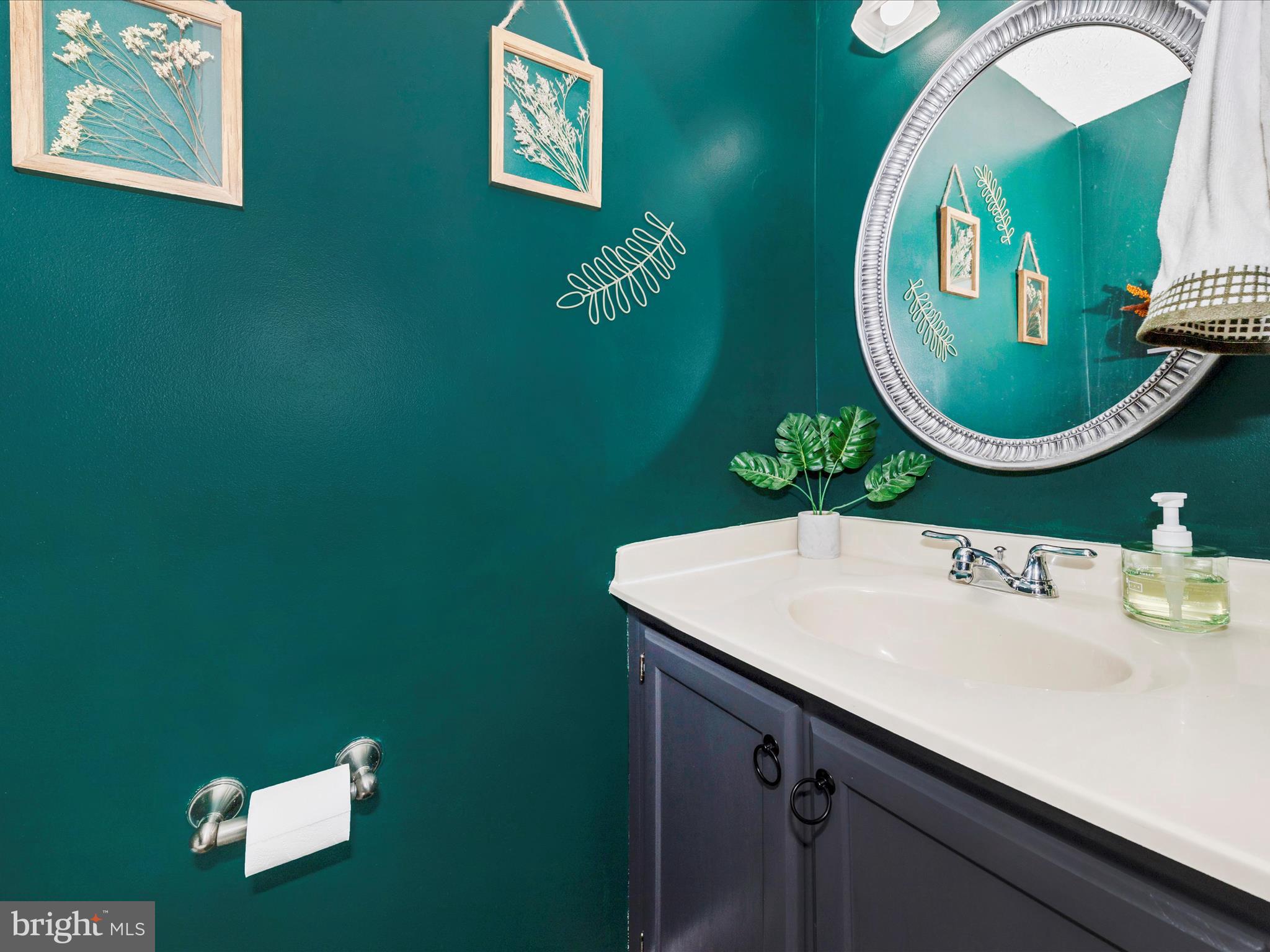 7283 Procopio Circle Columbia, MD 21046 - Photo 14 of 39 a bathroom with a sink and mirror
