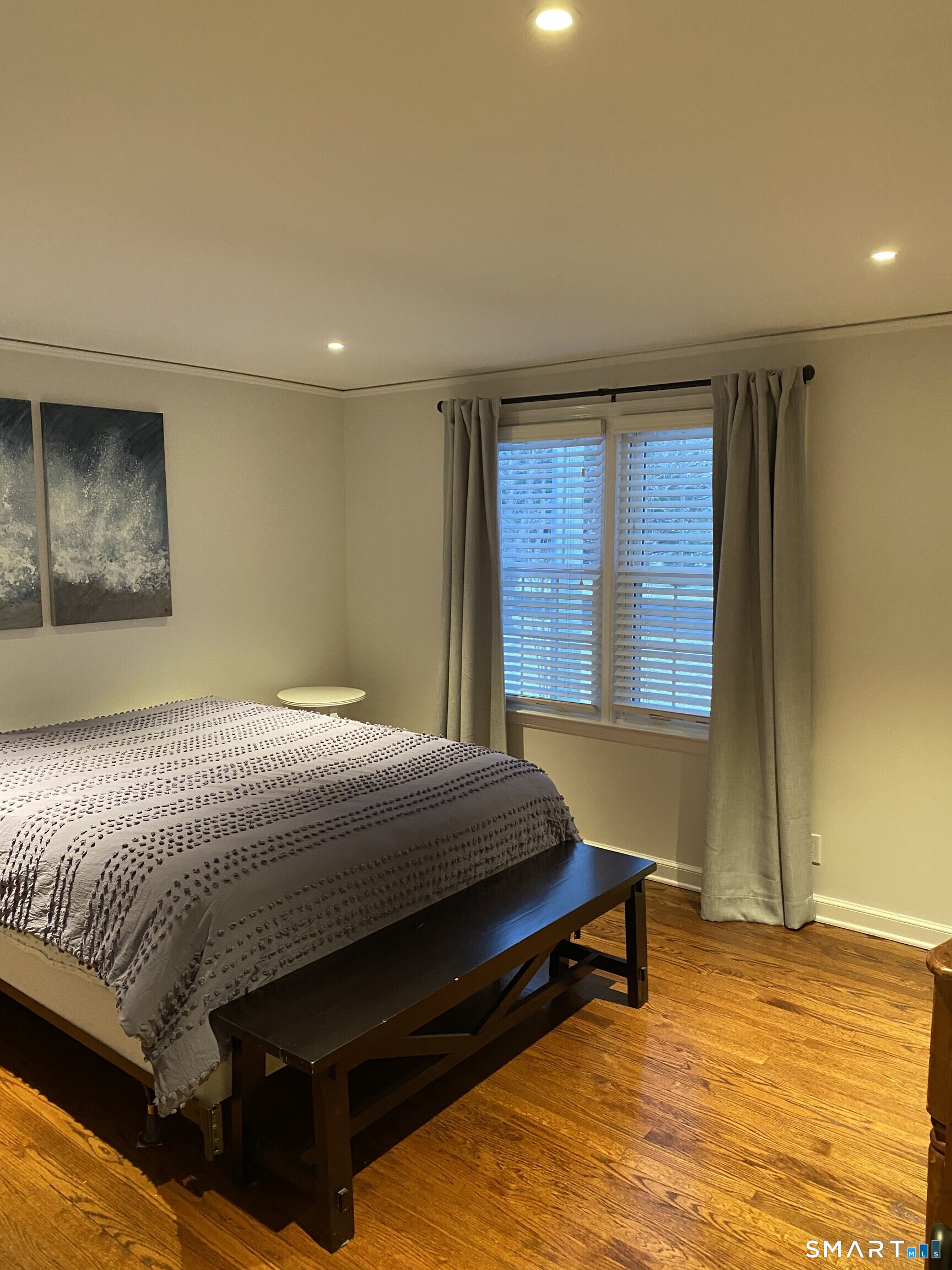 276 Dunnlea Road Fairfield, CT 06824 - Photo 11 of 26 a bedroom with a bed and window