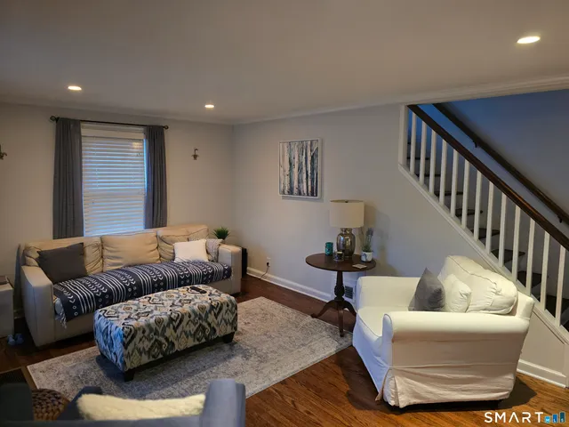 a living room with furniture and a couch