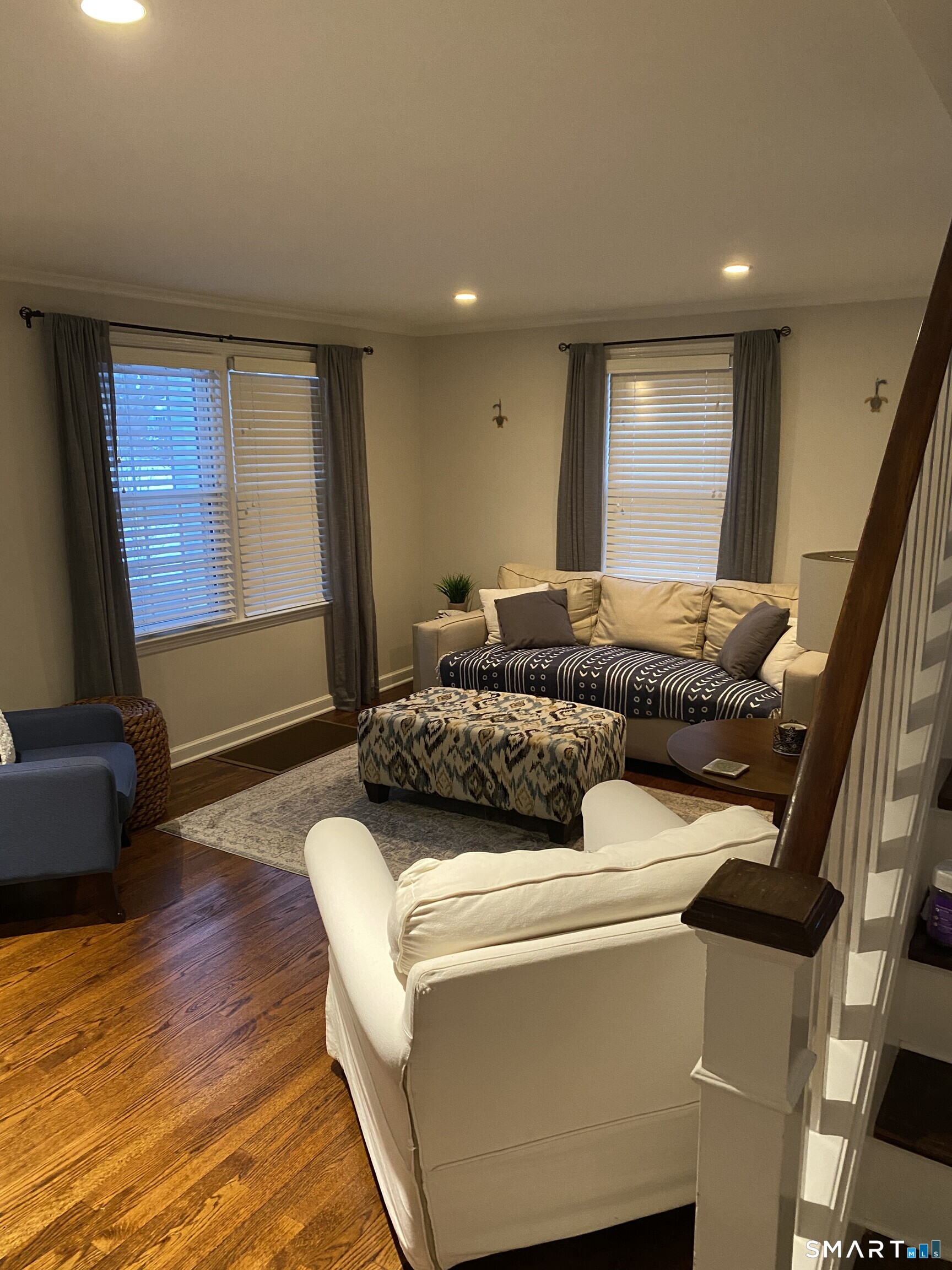 276 Dunnlea Road Fairfield, CT 06824 - Photo 7 of 26 a living room with furniture and a window