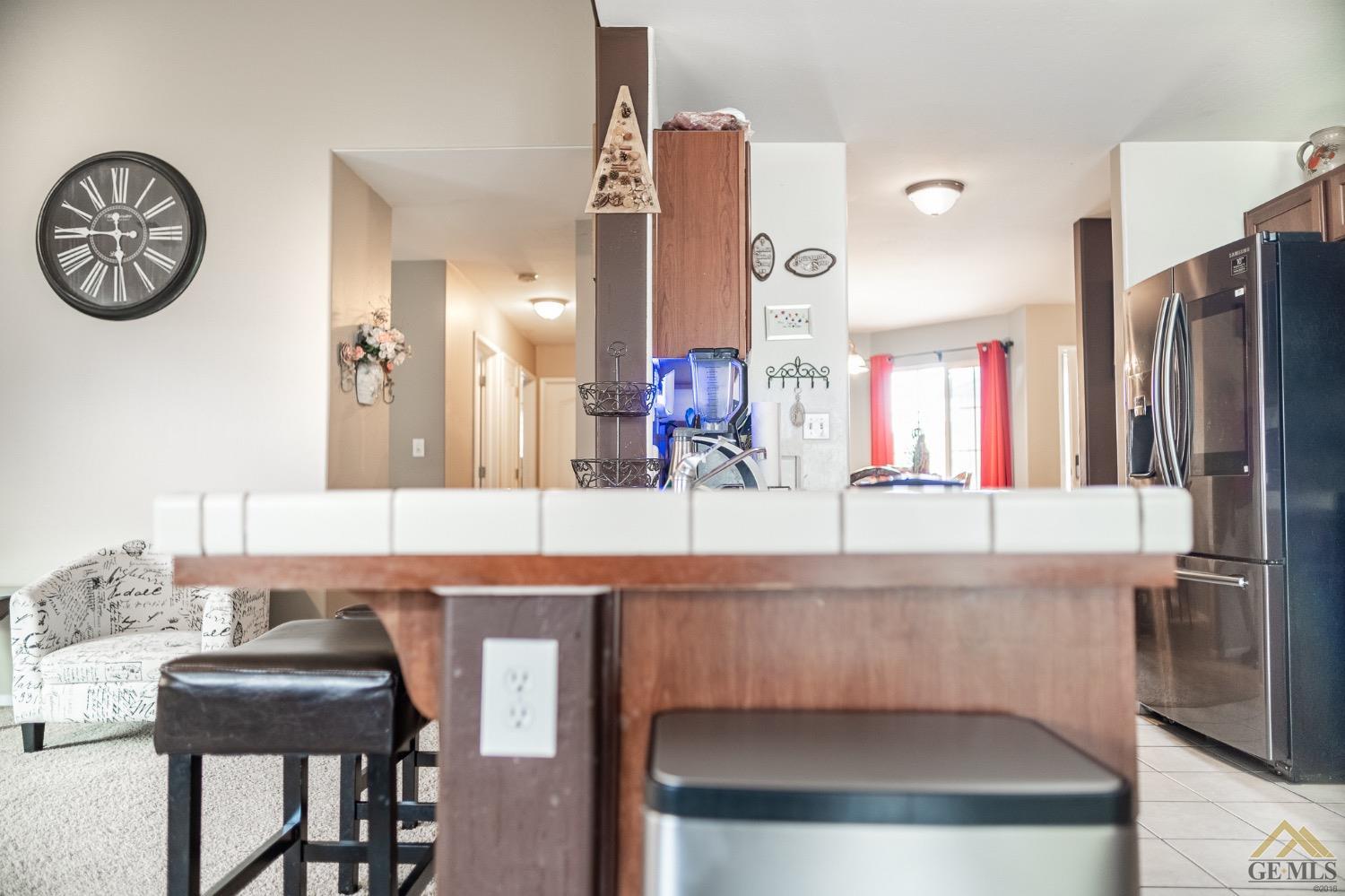 Undisclosed Address Bakersfield, CA 93311 - Photo 12 of 26 a bathroom with a sink a mirror and a window
