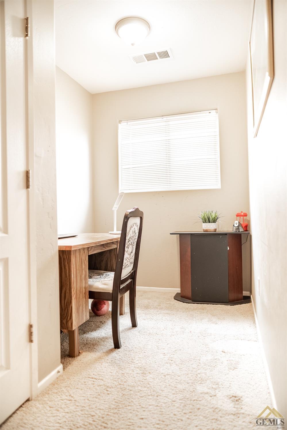 Undisclosed Address Bakersfield, CA 93311 - Photo 15 of 26 a workspace with furniture and window