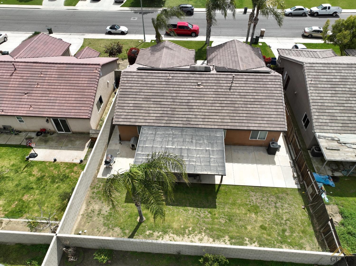 Undisclosed Address Bakersfield, CA 93311 - Photo 3 of 26 a view of backyard with swimming pool
