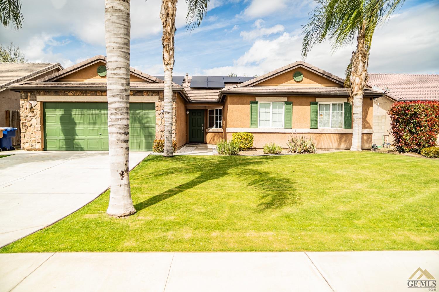 Undisclosed Address Bakersfield, CA 93311 - Photo 4 of 26 a view of swimming pool with a garden