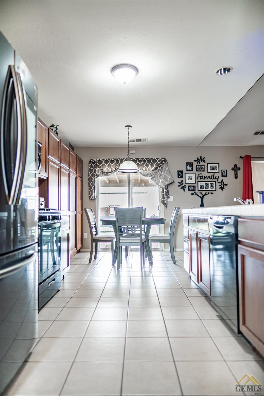 Undisclosed Address Bakersfield, CA 93311 - Photo 8 of 26 a group of chairs sitting in kitchen and kitchen