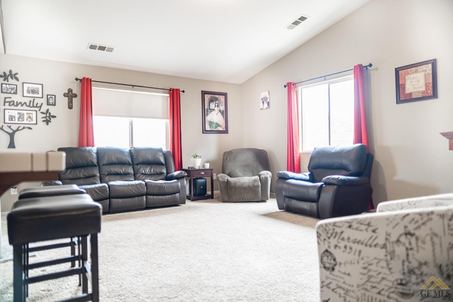 Undisclosed Address Bakersfield, CA 93311 - Photo 9 of 26 a living room with furniture and a window