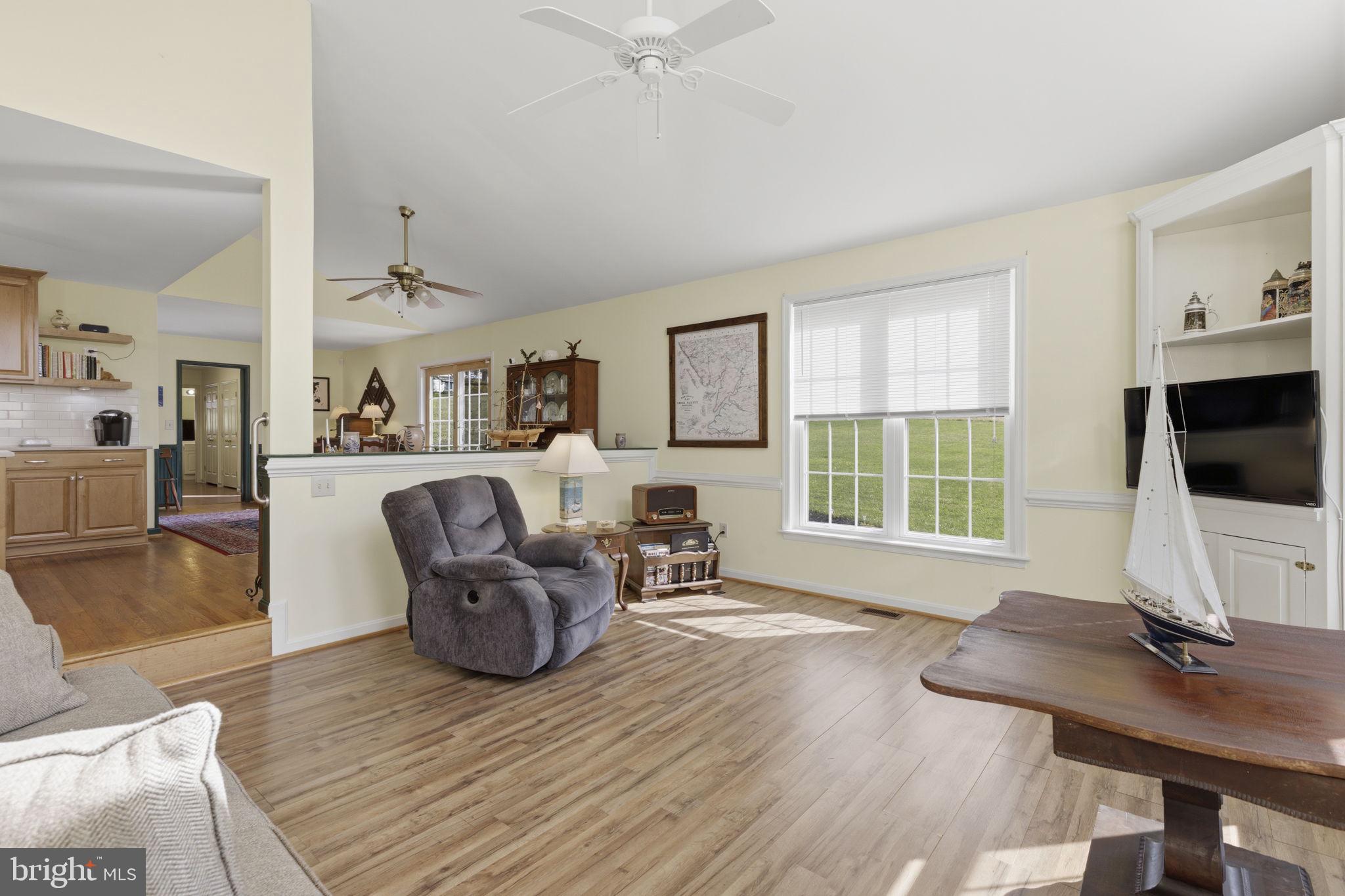 3831 Wilkinson Road Havre de Grace, MD 21078 - Photo 13 of 51 a workspace with furniture window and wooden floor