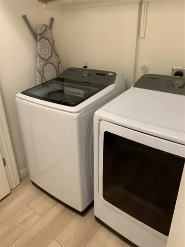 a stove top oven sitting inside of a kitchen