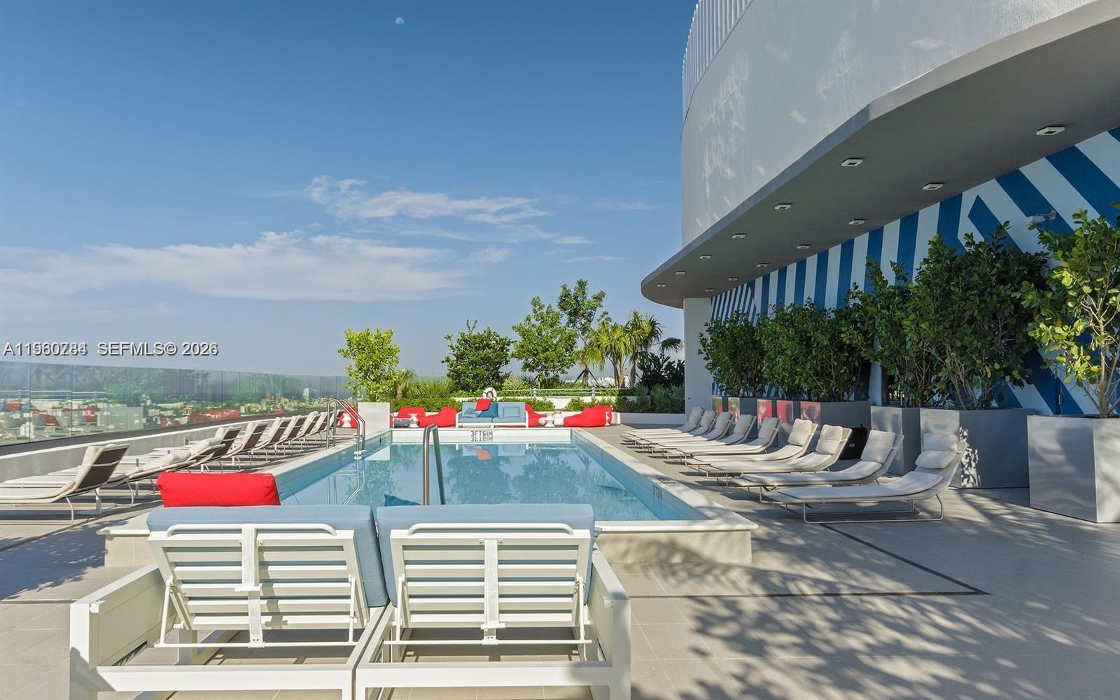 45 Southwest 9th Street, Unit 1805 Miami, FL 33130 - Photo 14 of 22 a view of a chairs and table in patio