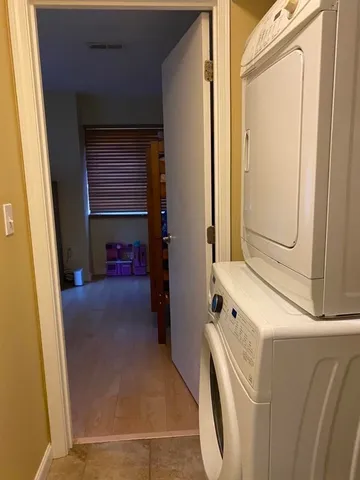 a view of walk in closet with window