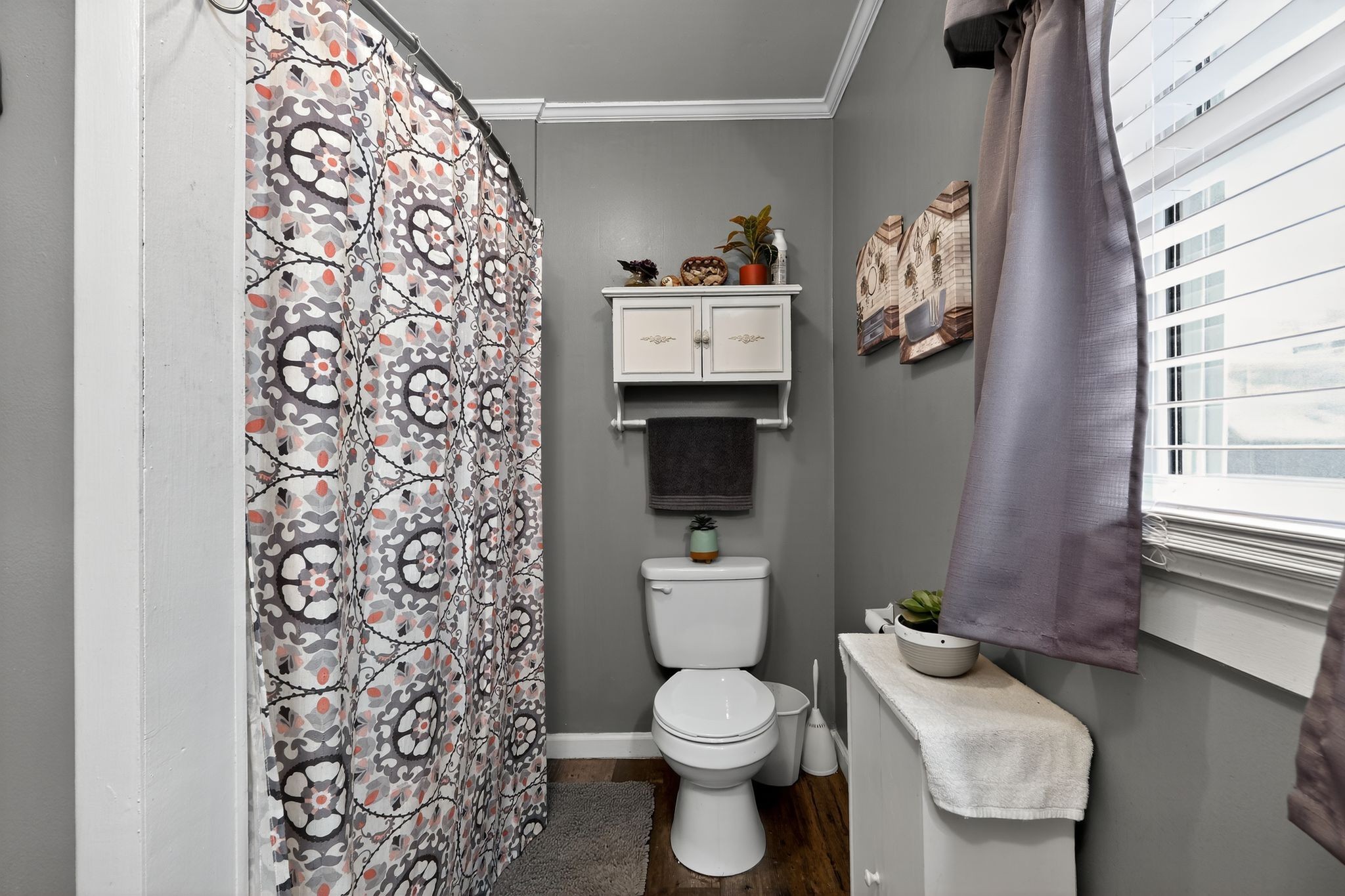 3119 Tyree Springs Road Hendersonville, TN 37075 - Photo 21 of 61 a white toilet sitting next to a bathroom sink