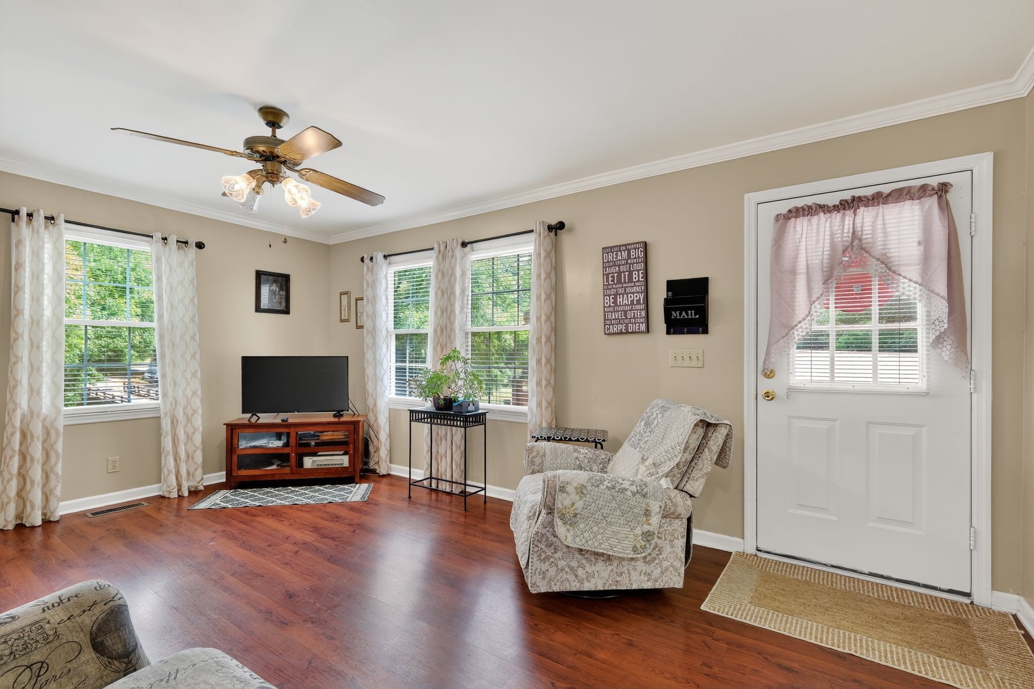3119 Tyree Springs Road Hendersonville, TN 37075 - Photo 6 of 61 a living room with furniture and a flat screen tv
