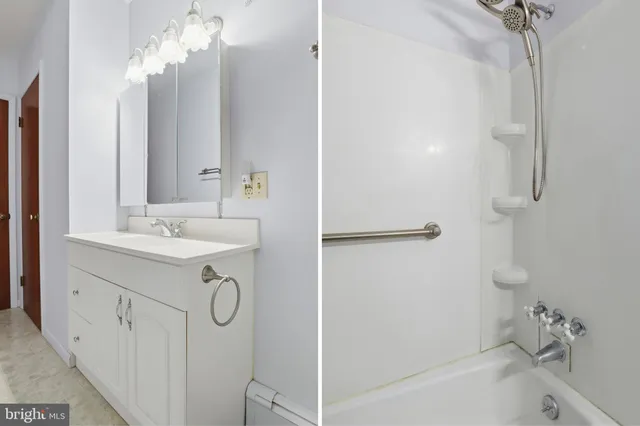 a view of a livingroom with furniture and a fan