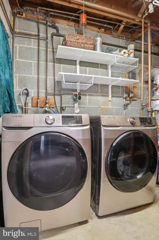 a view of a livingroom with furniture and a flat screen tv