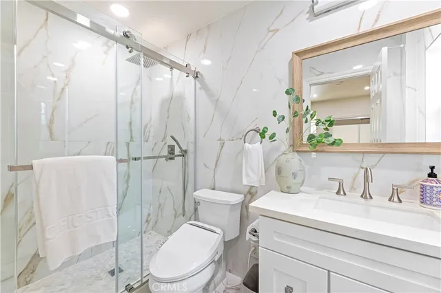 a kitchen with stove and cabinets