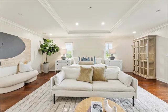 a bathroom with a sink toilet double vanity and shower