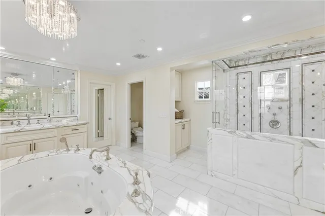a view of storage and utility room with washer and dryer