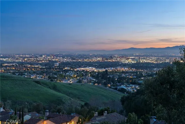 a view of a patio with a table and chairs