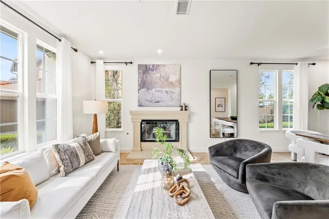a view of a dining room with furniture and window