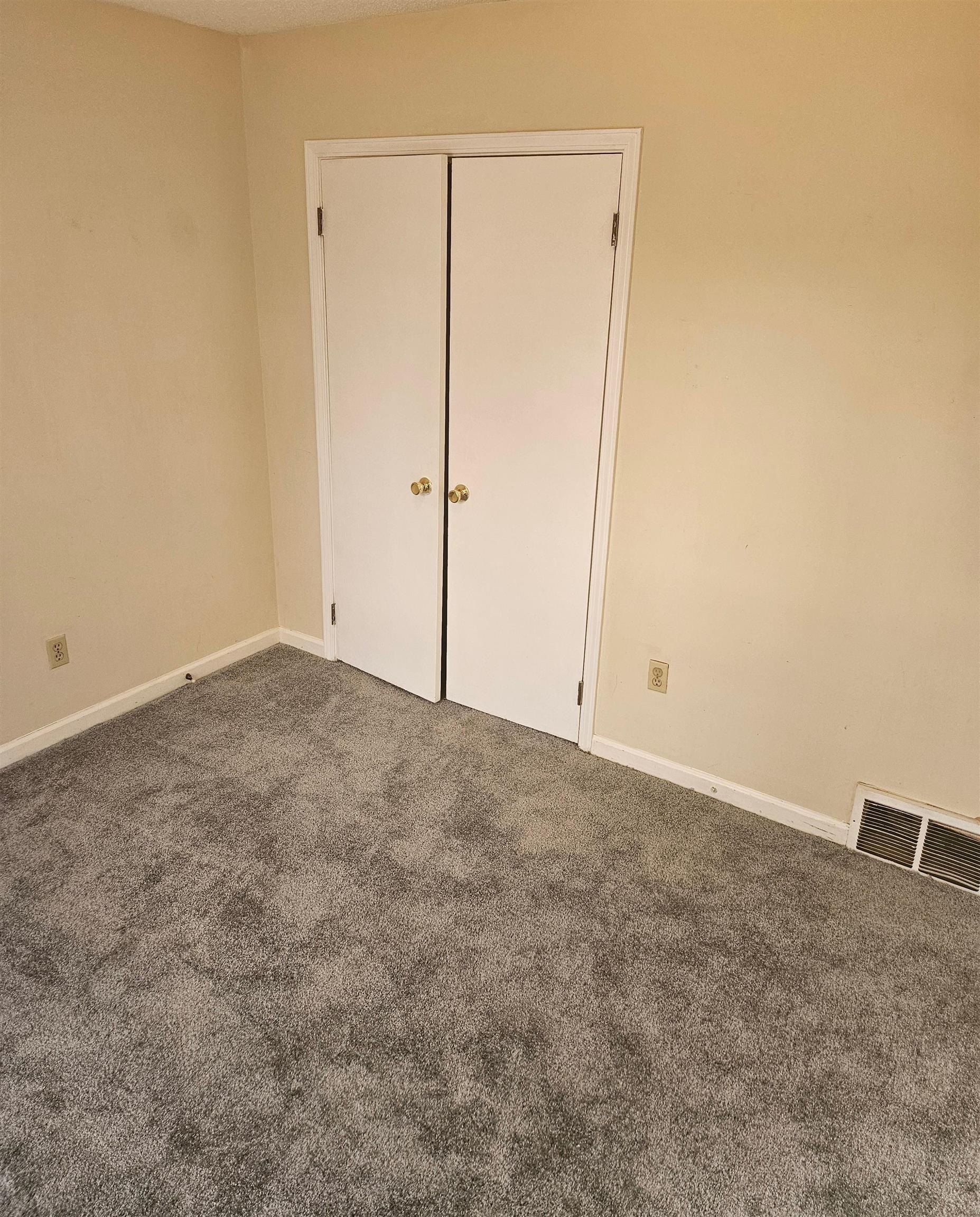 4262 Water Briar Road Millington, TN 38053 - Photo 19 of 21 Unfurnished bedroom with a closet, baseboards, visible vents, and carpet flooring