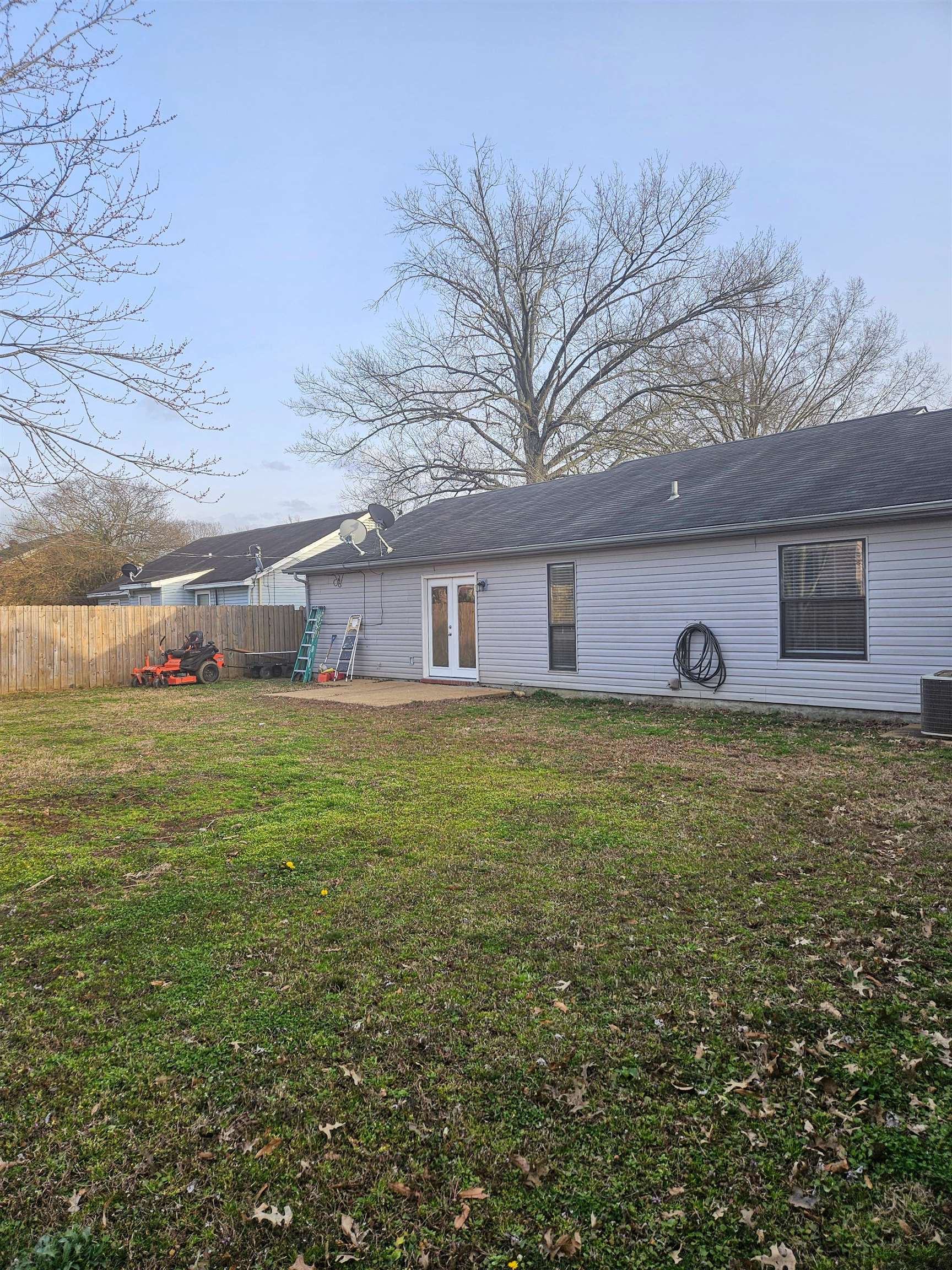 4262 Water Briar Road Millington, TN 38053 - Photo 21 of 21 Back of house with a yard, a patio area, fence, and french doors