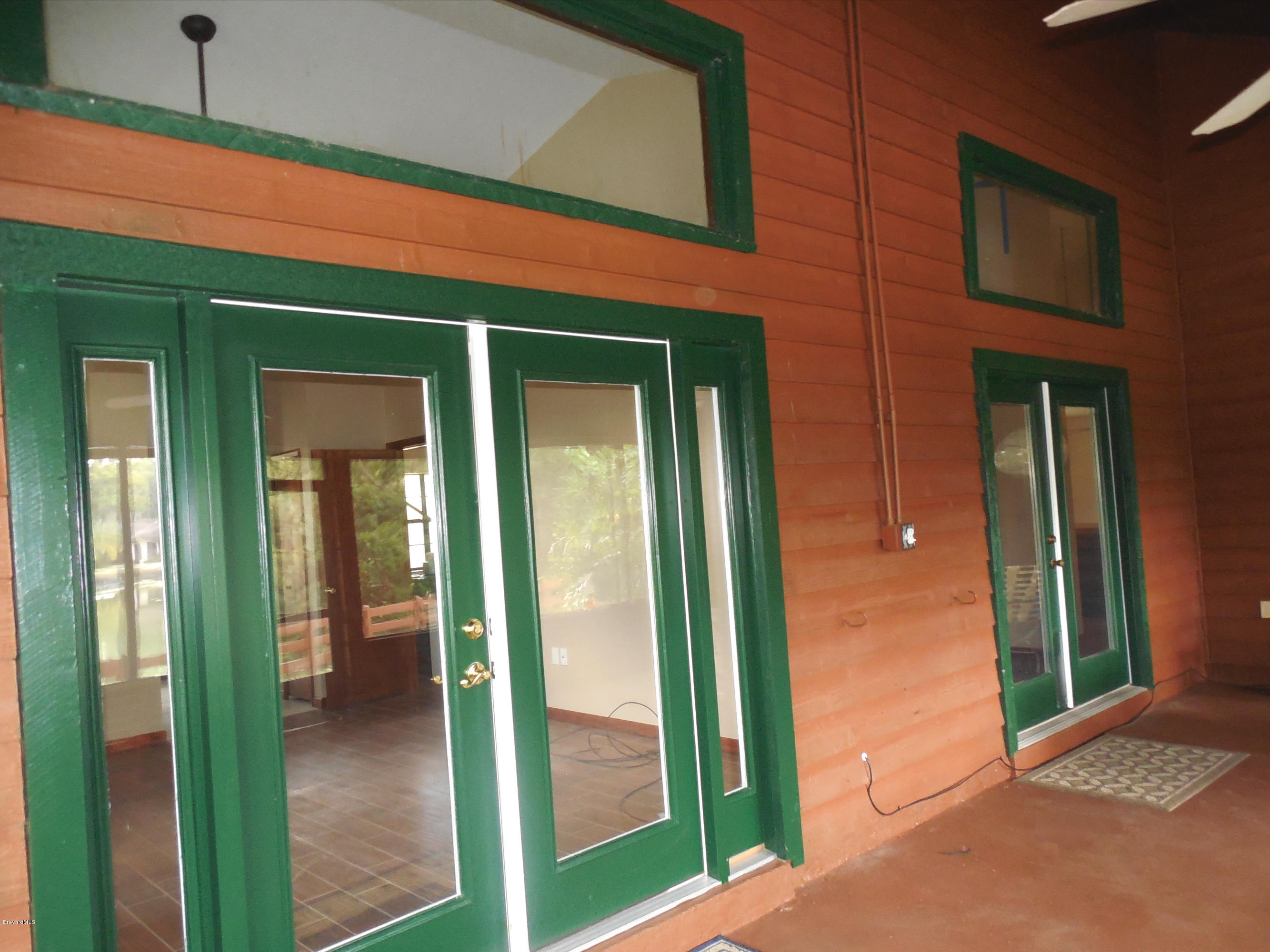3445 Lionel Road Mims, FL 32754 - Photo 25 of 29 Large back screened porch