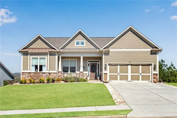front view of a house with a yard