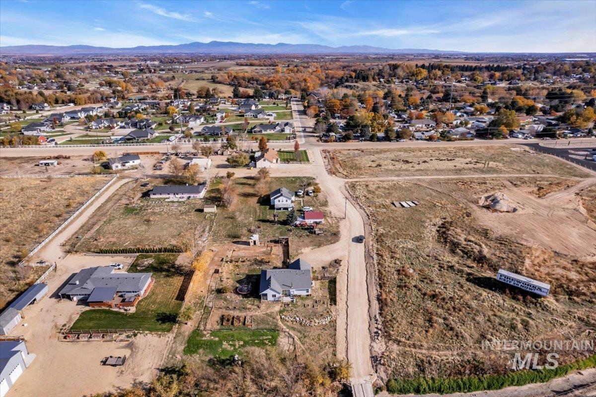 15046 Burger Lane Caldwell, ID 83607 - Photo 29 of 31 View of property location featuring nearby suburban area and a mountainous background