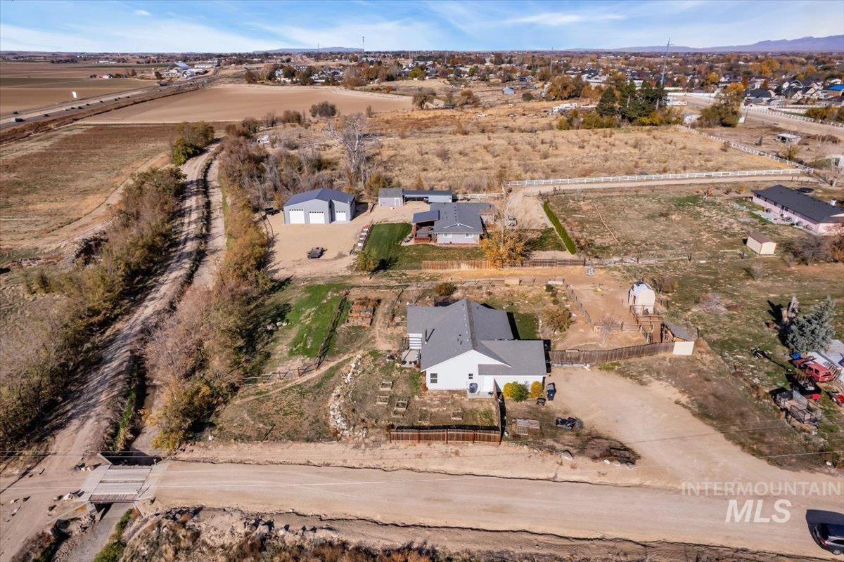15046 Burger Lane Caldwell, ID 83607 - Photo 30 of 31 Aerial view of property and surrounding area with rural landscape