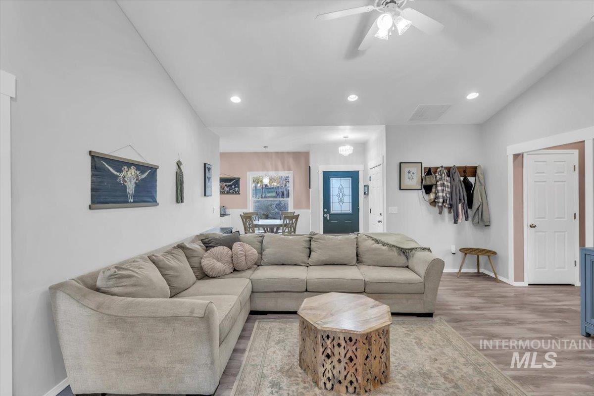 15046 Burger Lane Caldwell, ID 83607 - Photo 5 of 31 Living area featuring recessed lighting, wood finished floors, and a ceiling fan