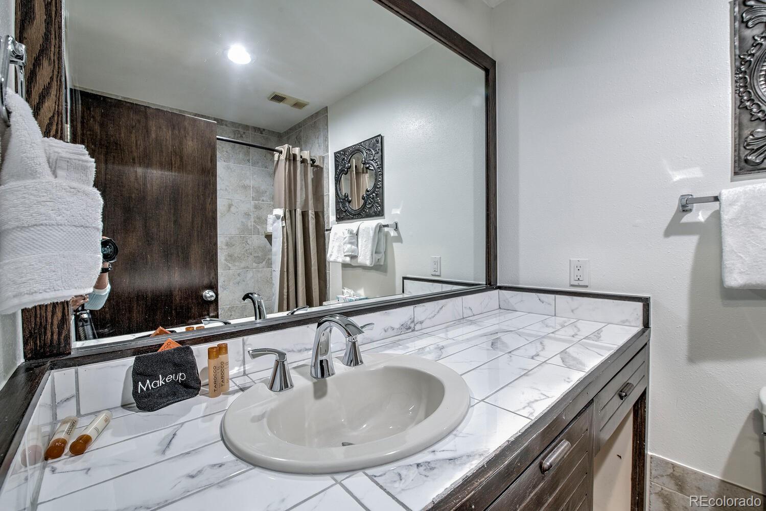 1211 West Keystone Road, Unit 2738 Keystone, CO 80435 - Photo 12 of 23 a bathroom with a sink and a mirror