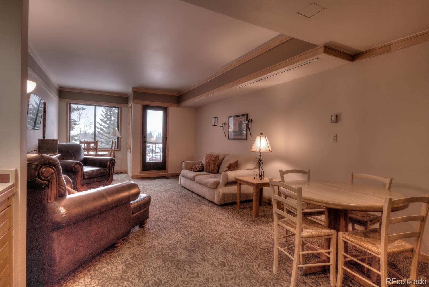 1211 West Keystone Road, Unit 2738 Keystone, CO 80435 - Photo 20 of 23 a living room with furniture and a large window
