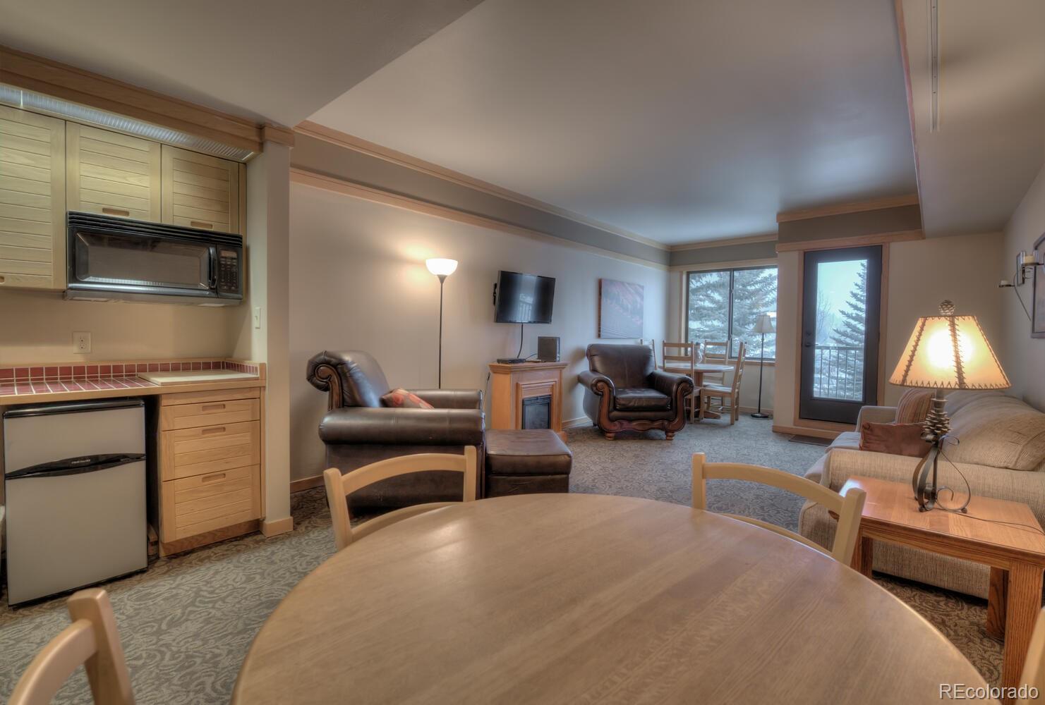 1211 West Keystone Road, Unit 2738 Keystone, CO 80435 - Photo 21 of 23 a living room with furniture and windows