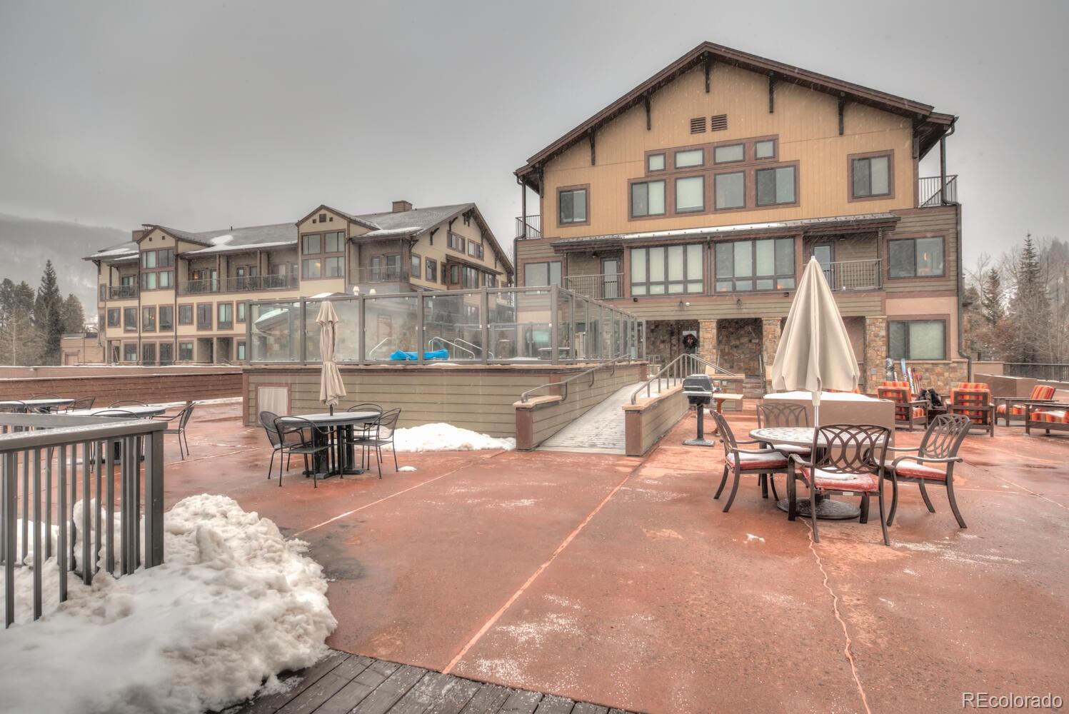 1211 West Keystone Road, Unit 2738 Keystone, CO 80435 - Photo 22 of 23 a view of a building with sitting area