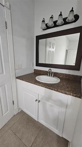 a building outdoor space with patio furniture and mountain view