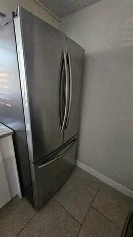 a room with storage and a wall