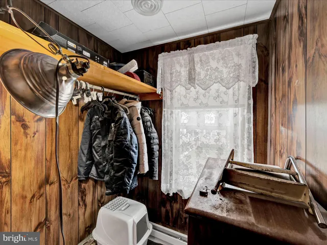 a view of a patio with a table and chairs