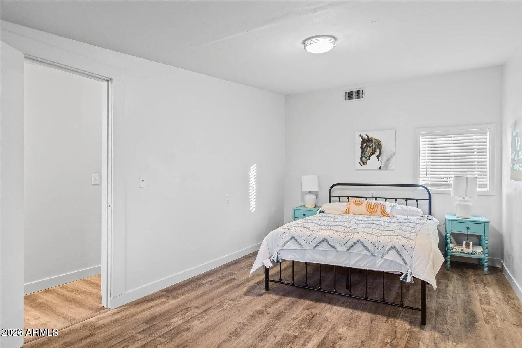 5065 Forest View Road Lakeside, AZ 85929 - Photo 18 of 24 a bedroom with a bed and a table in it