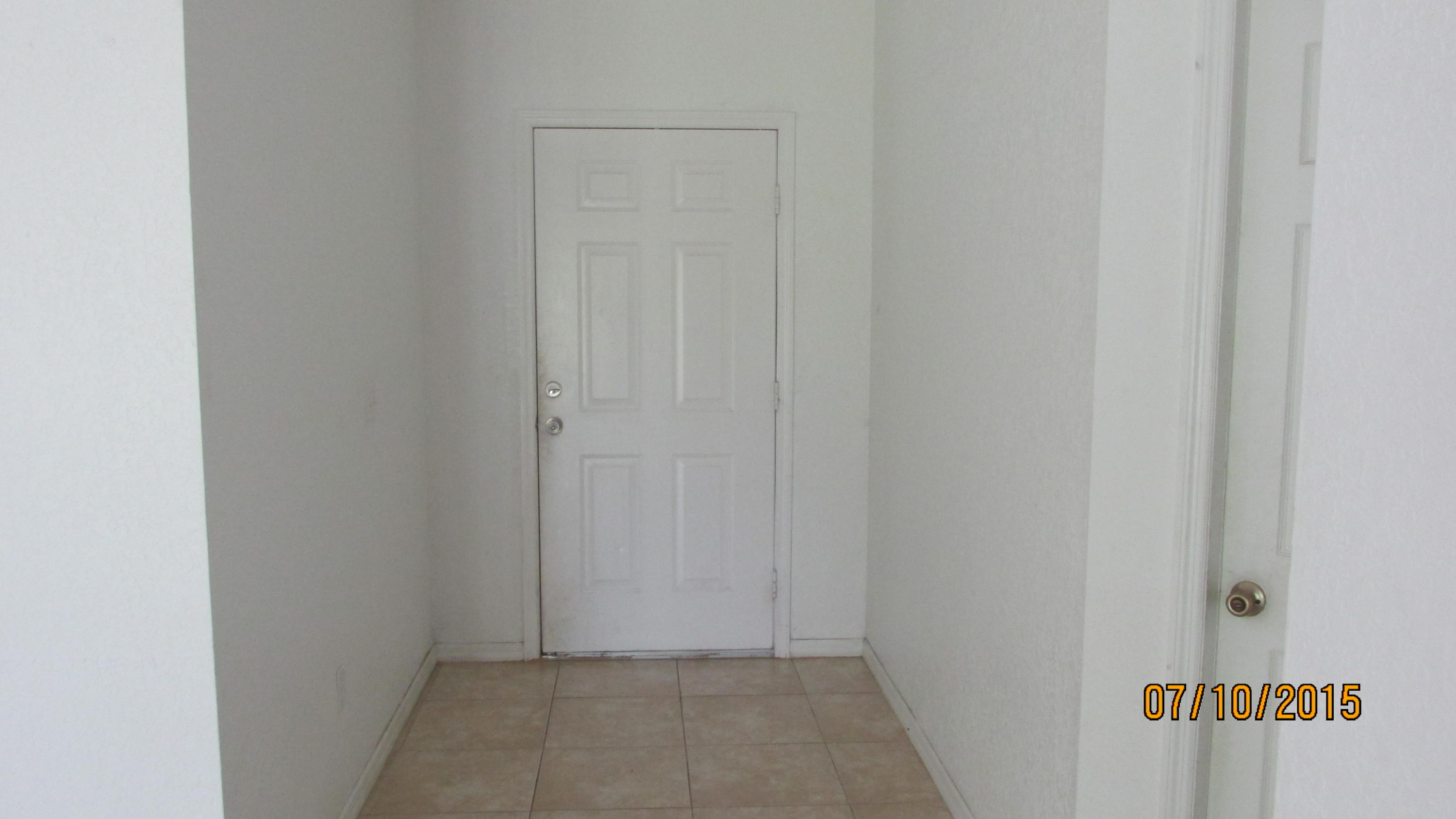 2382 Southeast Merrill Road Port St. Lucie, FL 34952 - Photo 3 of 17 IMG_2375