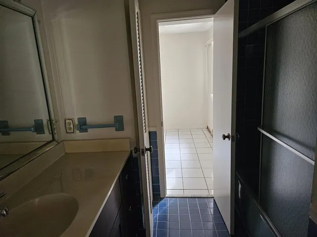 a bathroom with a toilet and a sink