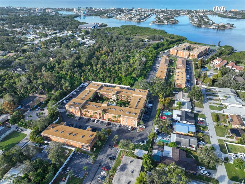 12760 Indian Rocks Road, Unit 413 Largo, FL 33774 - Photo 1 of 27 an aerial view of a city with lots of residential buildings