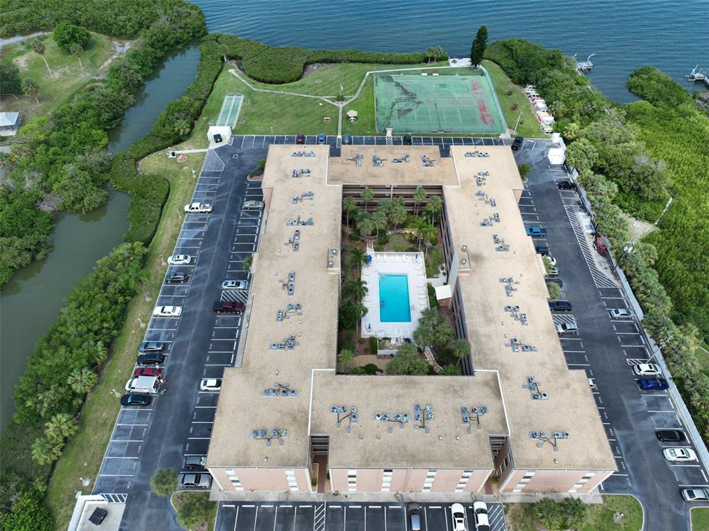 12760 Indian Rocks Road, Unit 413 Largo, FL 33774 - Photo 19 of 27 an aerial view of residential houses with outdoor space