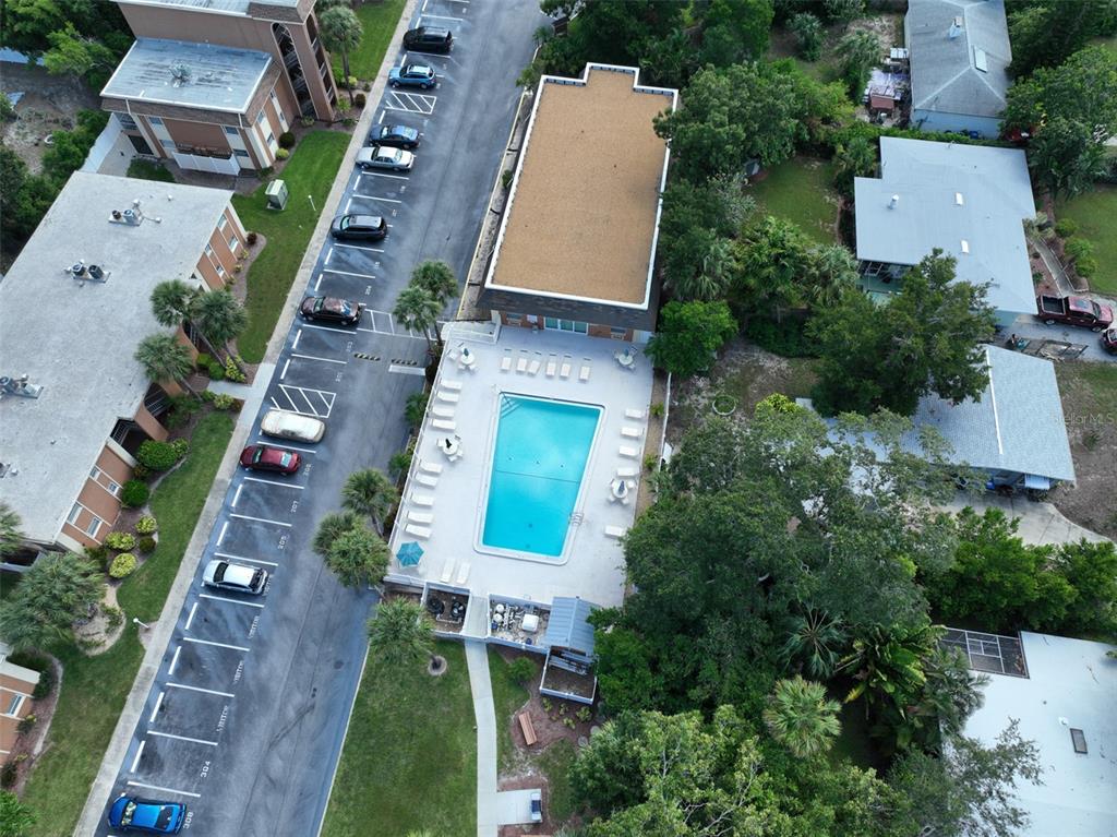 12760 Indian Rocks Road, Unit 413 Largo, FL 33774 - Photo 20 of 27 an aerial view of a house with a yard