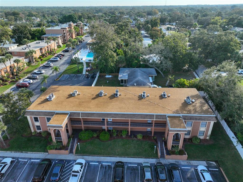 12760 Indian Rocks Road, Unit 413 Largo, FL 33774 - Photo 2 of 27 an aerial view of a house with a yard