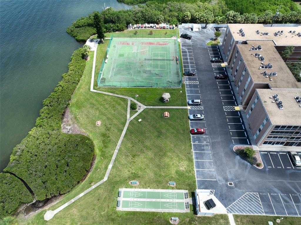 12760 Indian Rocks Road, Unit 413 Largo, FL 33774 - Photo 24 of 27 an aerial view of a pool yard and outdoor seating