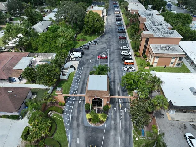 an aerial view of house with swimming pool