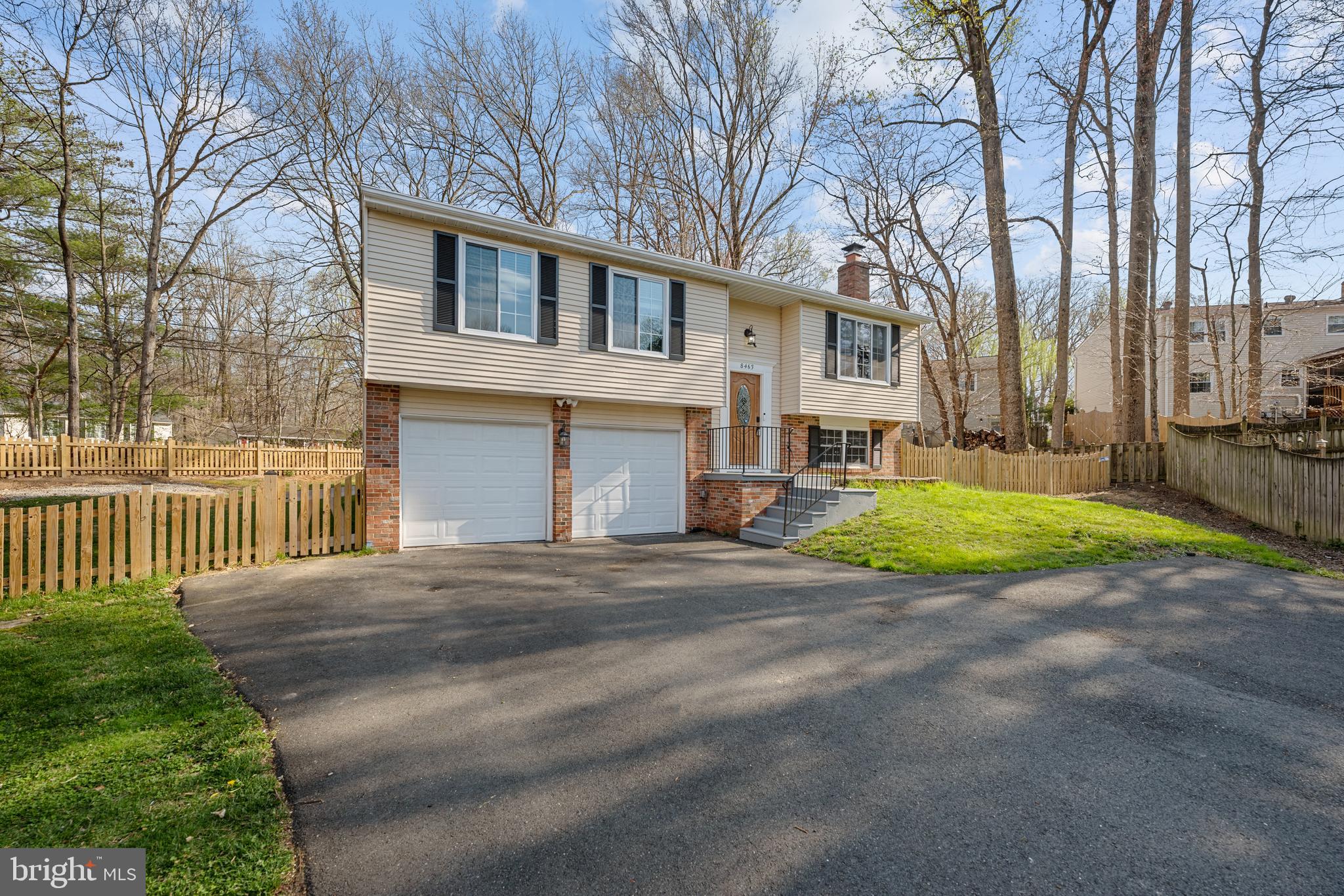 8463 Yellow Leaf Court Springfield, VA 22153 - Photo 25 of 38 Front Exterior and Oversized Driveway
