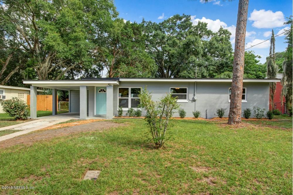 6758 Orkney Road Jacksonville, FL 32211 - Photo 3 of 23 front view of a house with a yard