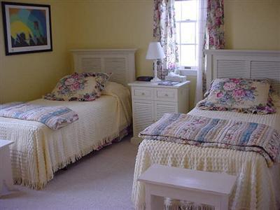 12 Knowles Heights Road Truro, MA 02666 - Photo 8 of 14 a bedroom with a bed and a window