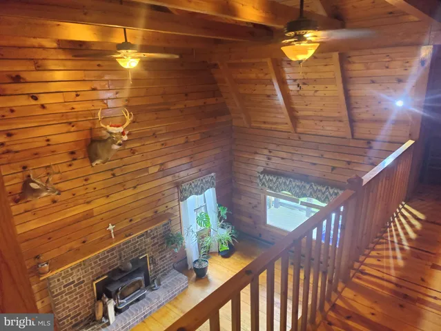 a view of balcony with wooden floor